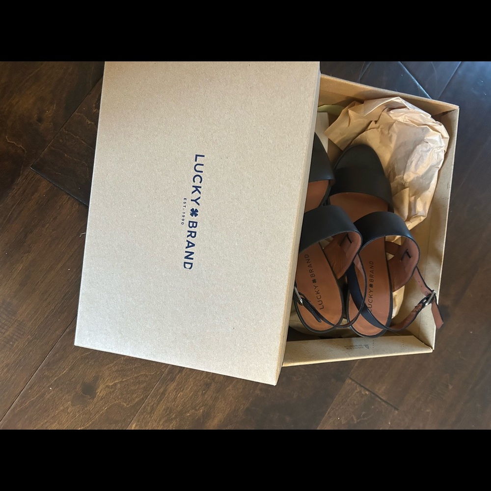 New Lucky Brand black leather sandals with box size 8.5. Cushion bed.